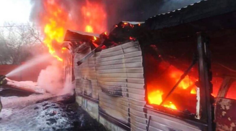 Building engulfed in flames and smoke