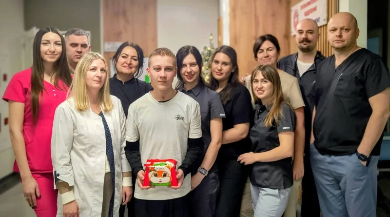 Group photo in medical setting.